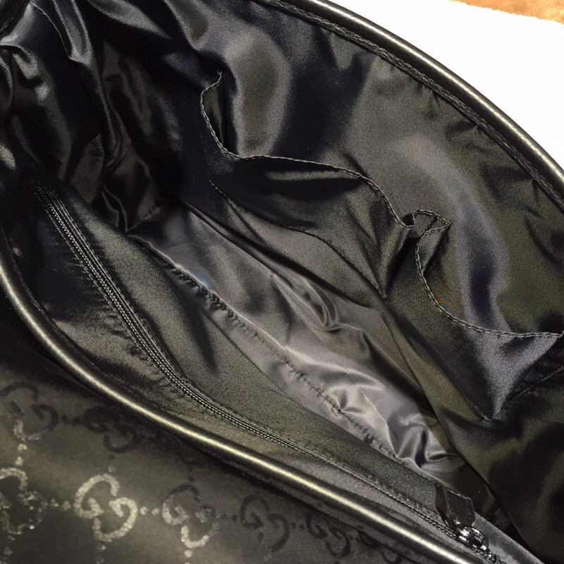 G*u*i handbag