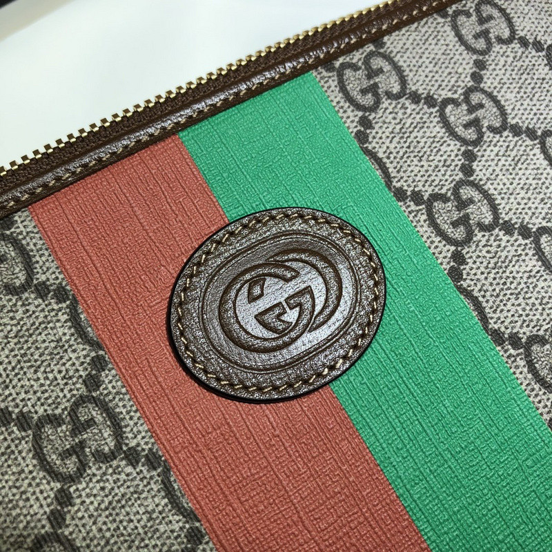 G*u*i clutch bag