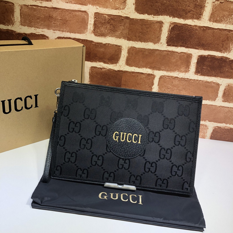 G*u*i clutch bag